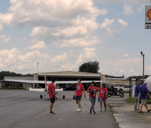 Camp Students returning from flight